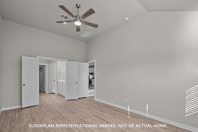 528 Flower Reed Ct, Magnolia, TX 77354 - unfurnished bedroom featuring vaulted ceiling, light wood finished floors, and baseboards