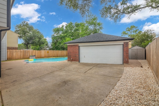 1118 Cheyenne Meadows Dr, Katy, TX 77450 - detached garage with a storage unit and fence
