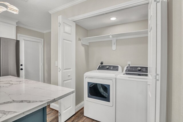 1118 Cheyenne Meadows Dr, Katy, TX 77450 - laundry room featuring dark wood-style floors, crown molding, washing machine and clothes dryer, recessed lighting, and baseboards