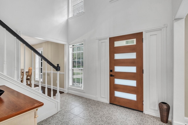1118 Cheyenne Meadows Dr, Katy, TX 77450 - foyer entrance featuring stairs and a high ceiling