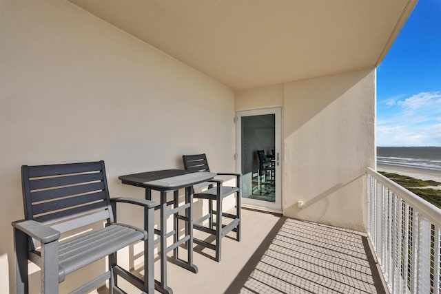 1401 E Beach Dr Unit 805/06, Galveston, TX 77550 - balcony with a water view