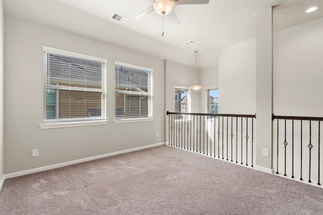 2531 Terrace Point Dr, Missouri City, TX 77459 - empty room featuring a ceiling fan, carpet flooring, and baseboards