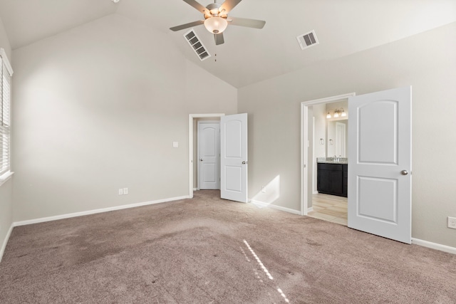 2531 Terrace Point Dr, Missouri City, TX 77459 - unfurnished bedroom with light carpet, high vaulted ceiling, baseboards, connected bathroom, and ceiling fan