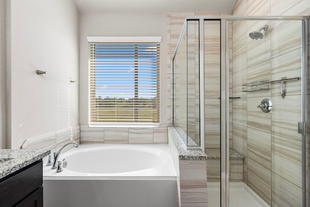 2531 Terrace Point Dr, Missouri City, TX 77459 - bathroom with a bath, vanity, and a stall shower