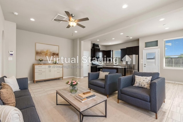 2531 Terrace Point Dr, Missouri City, TX 77459 - living room with recessed lighting, light tile patterned floors, ceiling fan, and baseboards
