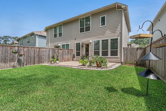 back of property with a patio area