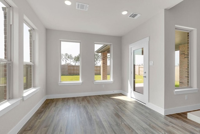 21611 Elmheart Dr, New Caney, TX 77357 - empty room featuring wood finished floors and recessed lighting