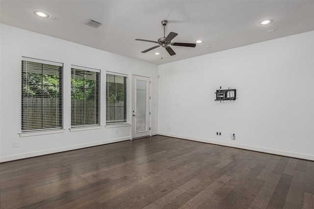 2305 Langston St, Houston, TX 77007 - unfurnished room featuring dark wood finished floors, ceiling fan, baseboards, and recessed lighting