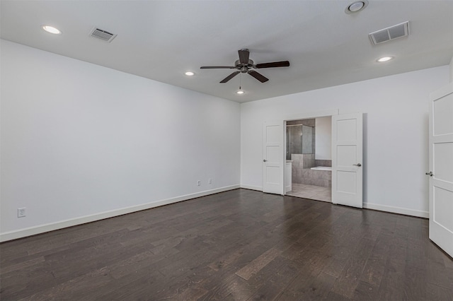 2305 Langston St, Houston, TX 77007 - unfurnished bedroom with dark wood-style floors, baseboards, recessed lighting, connected bathroom, and a ceiling fan