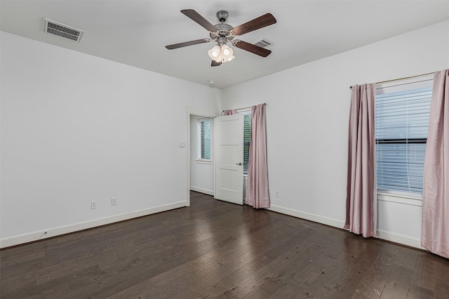 2305 Langston St, Houston, TX 77007 - spare room featuring wood-type flooring, a ceiling fan, and baseboards