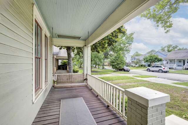 1316 Harvard St, Houston, TX 77008 - wooden terrace featuring covered porch and a residential view