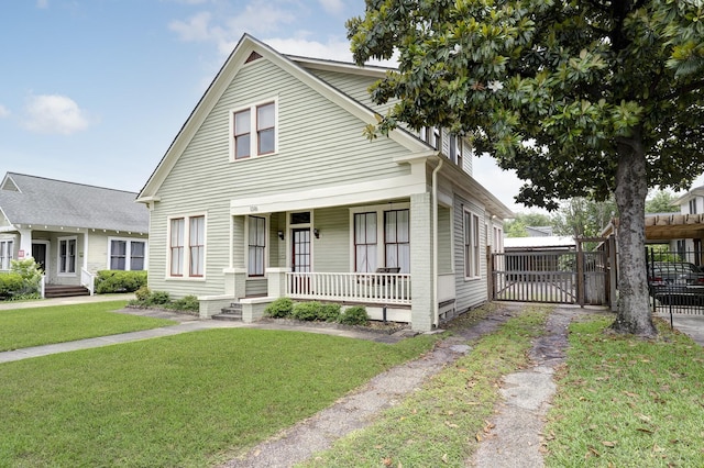 1316 Harvard St, Houston, TX 77008 - view of front of house featuring covered porch and a gate