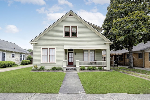 1316 Harvard St, Houston, TX 77008 - view of front facade featuring a porch and a front lawn