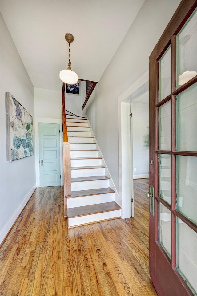1316 Harvard St, Houston, TX 77008 - staircase with wood finished floors and baseboards