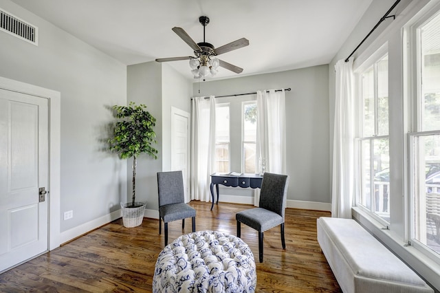 1316 Harvard St, Houston, TX 77008 - sitting room featuring plenty of natural light, dark wood-type flooring, ceiling fan, and baseboards