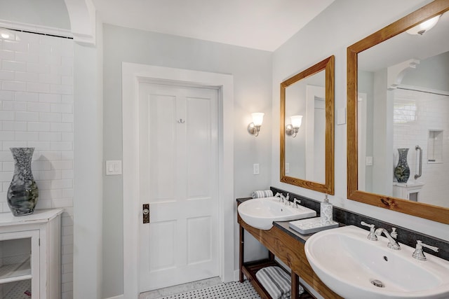 1316 Harvard St, Houston, TX 77008 - full bathroom featuring a sink and tile patterned floors