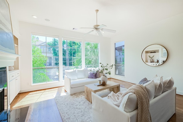 701 Asbury St, Houston, TX 77007 - living room with healthy amount of natural light, wood finished floors, ceiling fan, and recessed lighting