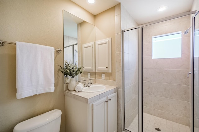 701 Asbury St, Houston, TX 77007 - full bath with toilet, vanity, and a shower stall