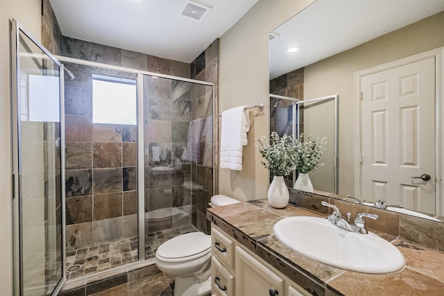 701 Asbury St, Houston, TX 77007 - bathroom with vanity, toilet, and a stall shower