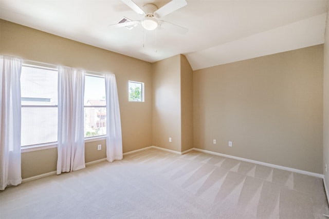701 Asbury St, Houston, TX 77007 - unfurnished room featuring light colored carpet, a ceiling fan, baseboards, and lofted ceiling