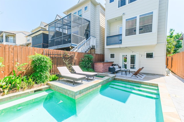 701 Asbury St, Houston, TX 77007 - view of swimming pool featuring a fenced backyard, french doors, a patio, and an outdoor living space