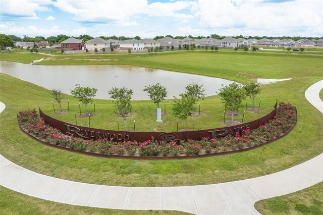 417 Amy St, Angleton, TX 77515 - view of home's community featuring a water view, a residential view, and a lawn