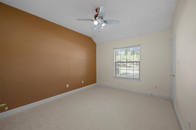 16503 Torry View Ter, Houston, TX 77095 - spare room featuring light carpet, vaulted ceiling, a ceiling fan, and baseboards
