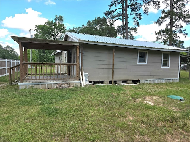 90 Oak Crest Dr, Shepherd, TX 77371 - view of side of home featuring metal roof