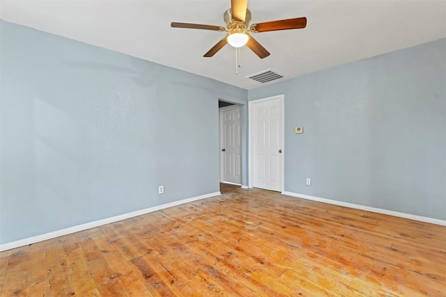 90 Oak Crest Dr, Shepherd, TX 77371 - empty room featuring ceiling fan, hardwood / wood-style flooring, and baseboards