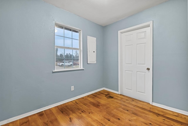 90 Oak Crest Dr, Shepherd, TX 77371 - unfurnished bedroom with baseboards and wood-type flooring