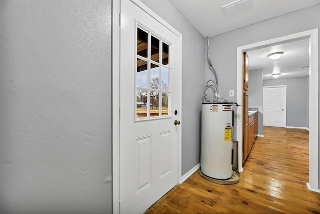 90 Oak Crest Dr, Shepherd, TX 77371 - utility room featuring electric water heater