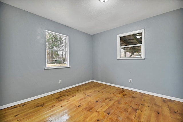 90 Oak Crest Dr, Shepherd, TX 77371 - spare room with hardwood / wood-style floors and baseboards