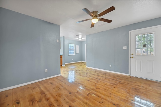 90 Oak Crest Dr, Shepherd, TX 77371 - spare room with ceiling fan, light wood-style flooring, and baseboards