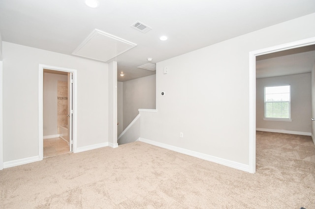4915 Market St, Houston, TX 77020 - spare room featuring attic access, carpet flooring, recessed lighting, and baseboards