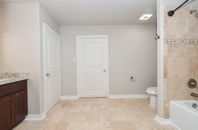 4915 Market St, Houston, TX 77020 - bathroom featuring toilet, vanity, bathtub / shower combination, and baseboards