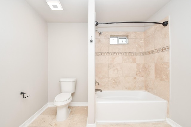 4915 Market St, Houston, TX 77020 - bathroom with toilet, tile patterned flooring, tub / shower combination, and baseboards