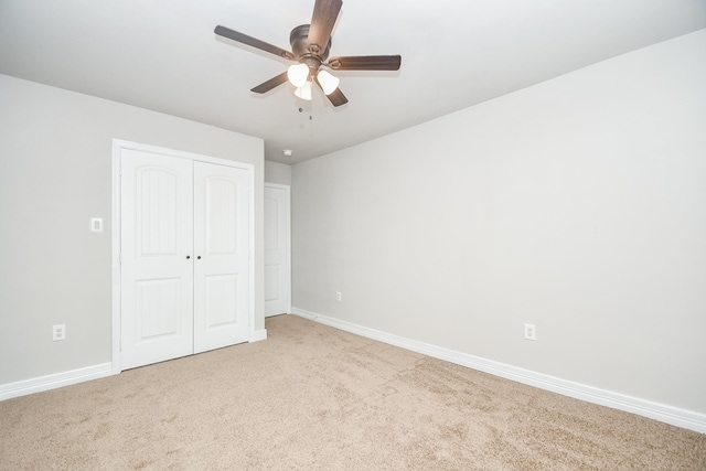 4915 Market St, Houston, TX 77020 - unfurnished bedroom featuring carpet floors, a closet, baseboards, and ceiling fan