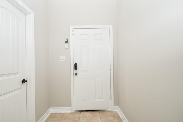 4915 Market St, Houston, TX 77020 - entryway with baseboards and light tile patterned floors
