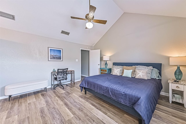 8111 Broadway St Unit 7, Galveston, TX 77554 - bedroom with wood finished floors, high vaulted ceiling, ceiling fan, and baseboards