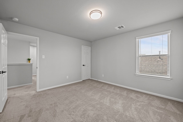 10902 Webber Ln, Texas City, TX 77591 - carpeted spare room with baseboards