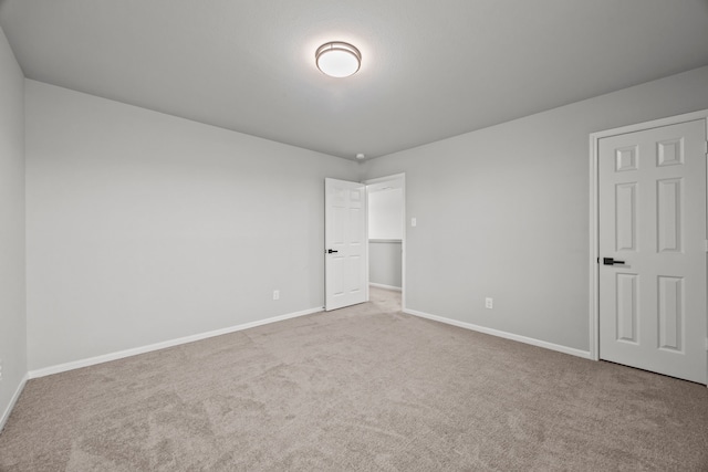 10902 Webber Ln, Texas City, TX 77591 - unfurnished bedroom featuring baseboards and carpet flooring