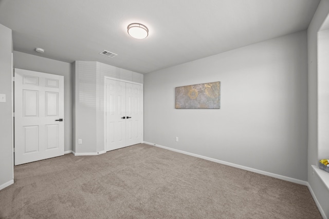 10902 Webber Ln, Texas City, TX 77591 - unfurnished bedroom featuring carpet, baseboards, and a closet