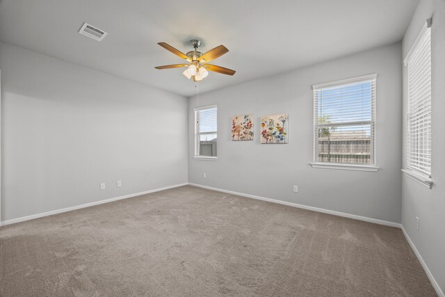 10902 Webber Ln, Texas City, TX 77591 - carpeted spare room featuring ceiling fan and baseboards