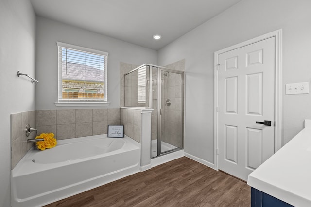 10902 Webber Ln, Texas City, TX 77591 - full bath featuring a shower stall, a bath, wood finished floors, vanity, and recessed lighting
