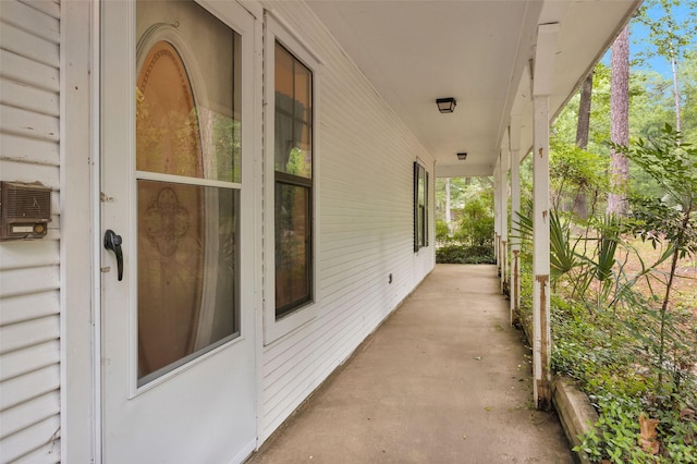 24614 Spruce, Huntsville, TX 77320 - view of patio featuring a porch