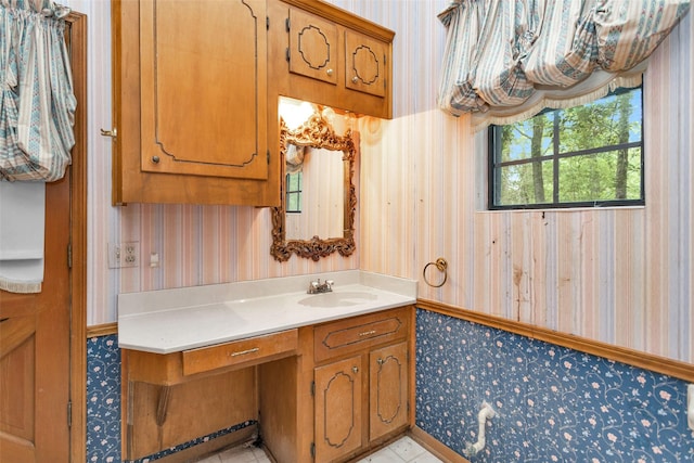 24614 Spruce, Huntsville, TX 77320 - bathroom featuring wallpapered walls and vanity