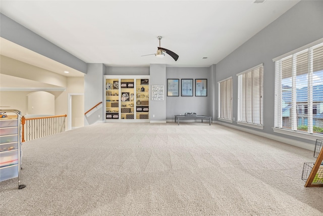 11310 Stonecreek Bend Ln, Cypress, TX 77433 - carpeted living area with ceiling fan and baseboards