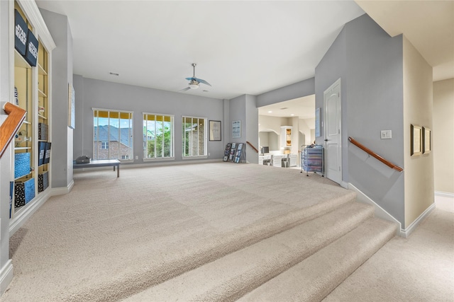 11310 Stonecreek Bend Ln, Cypress, TX 77433 - carpeted living area featuring ceiling fan and baseboards