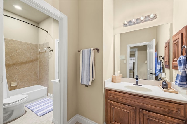 11310 Stonecreek Bend Ln, Cypress, TX 77433 - full bathroom with toilet, vanity, tile patterned flooring, and washtub / shower combination