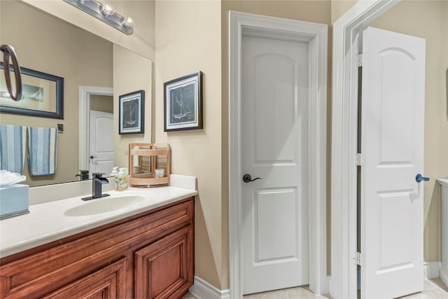 11310 Stonecreek Bend Ln, Cypress, TX 77433 - bathroom featuring vanity and baseboards